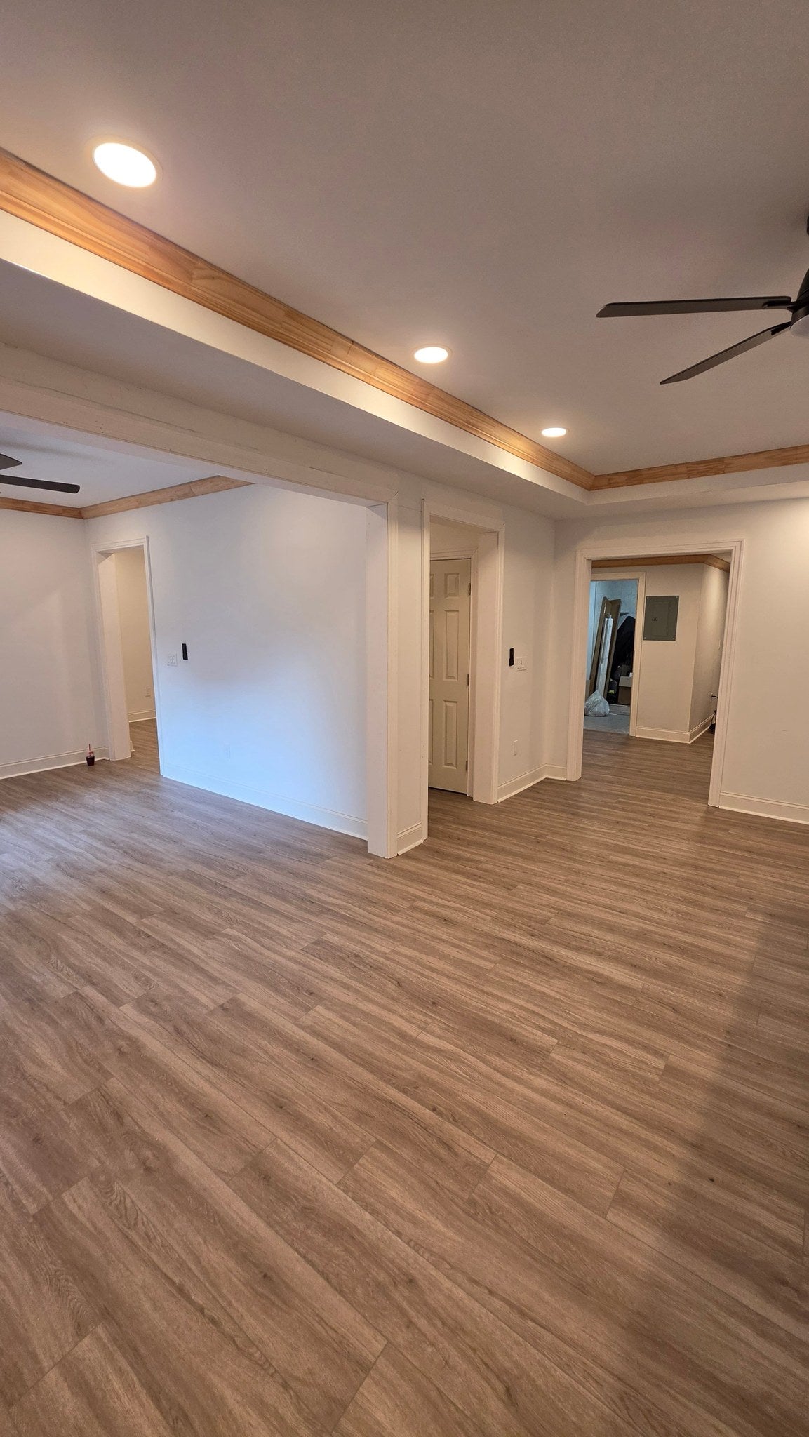 Khaki Iris wood-look SPC by Lexi, installed floor photo, basement